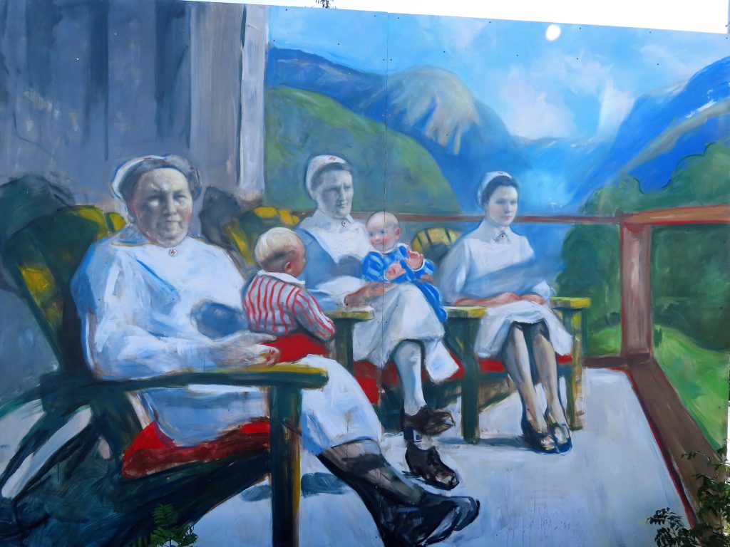 Vebjørn Sands maleri av sykepleiere med barn på fanget