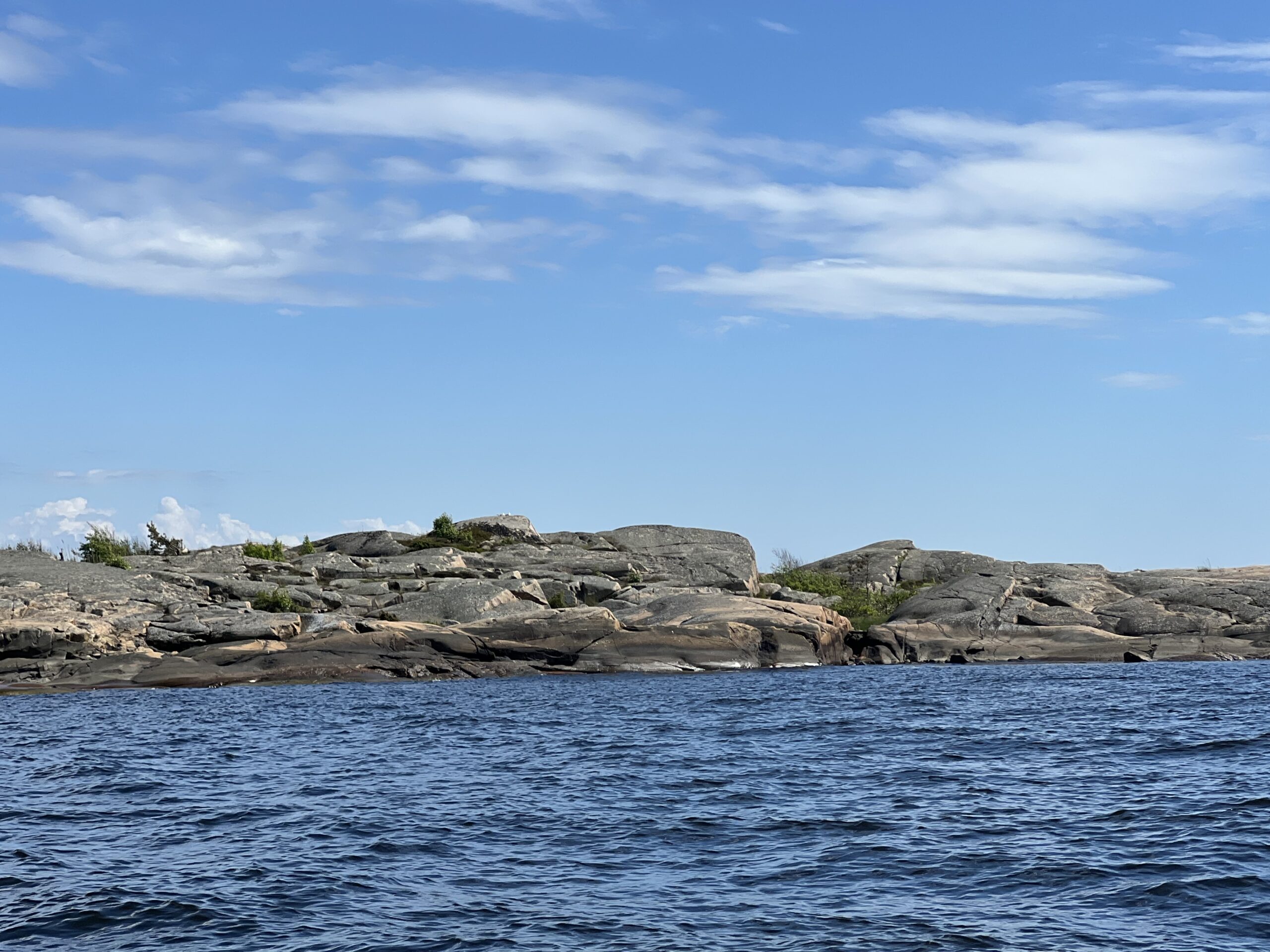 Kråkerøy sett fra sjøen – historier og minner gjennom 6 tiår. Deler av Glufsa