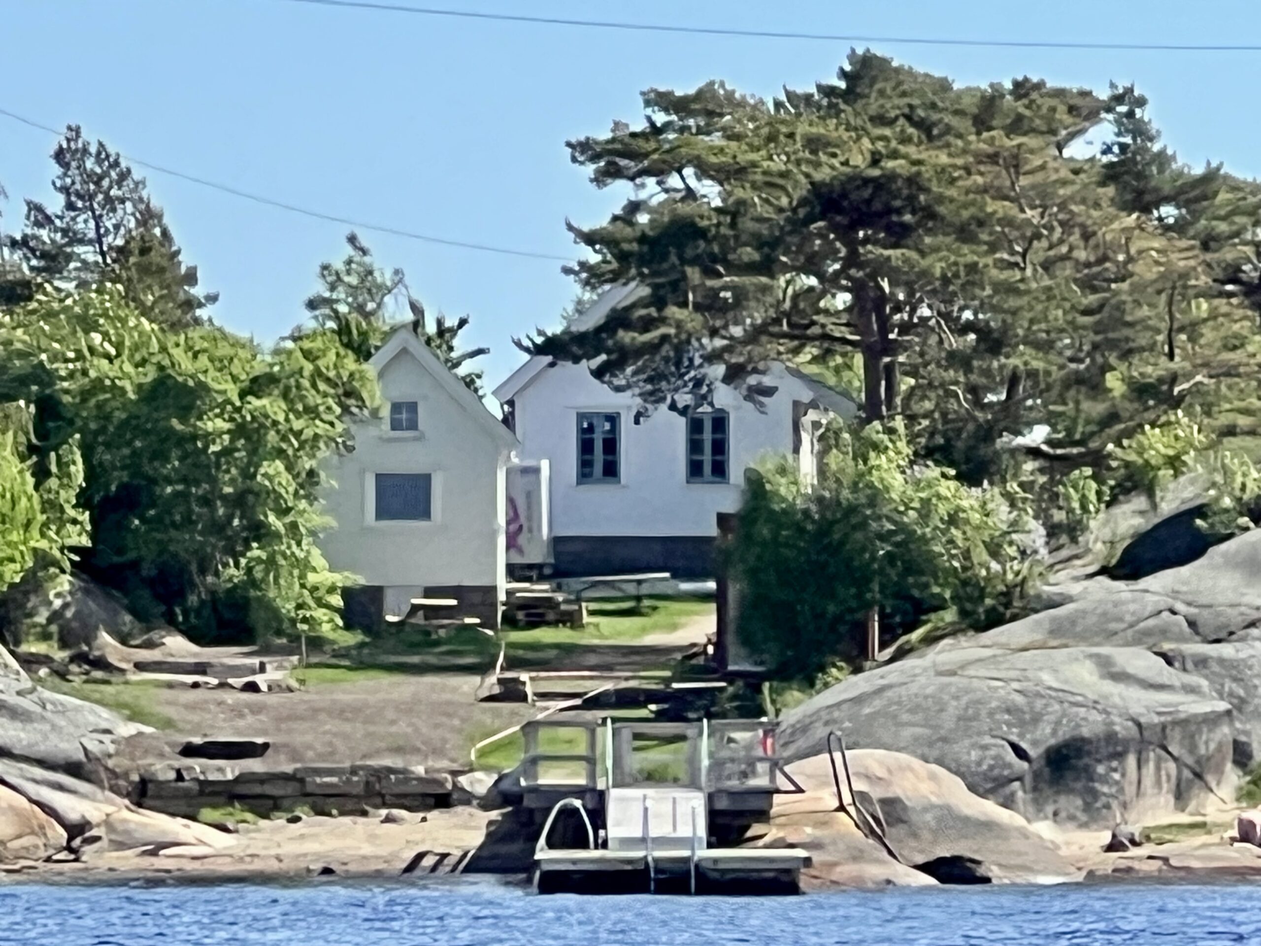 Kråkerøy sett fra sjøen – historier og minner gjennom 6 tiår. Pynten på Langøya. Her slutter båtturen